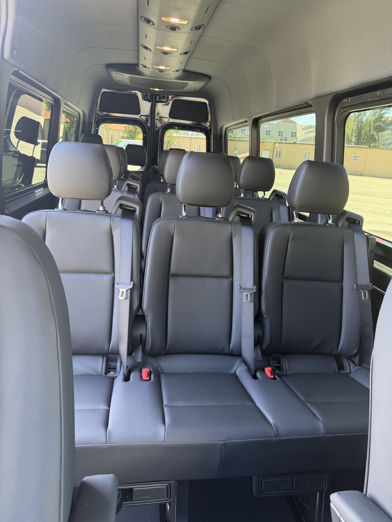Rear angle of the black Mercedes-Benz Sprinter van